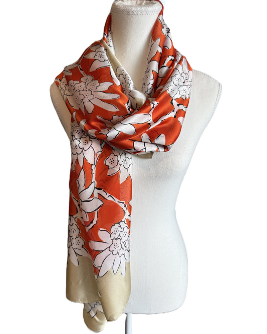 Silk blend scarf with vibrant red-orange floral design on taupe base, nzshawls, scaves in nz, pashmina nz , Women’s scarf, scarves nz, scarfs nz

