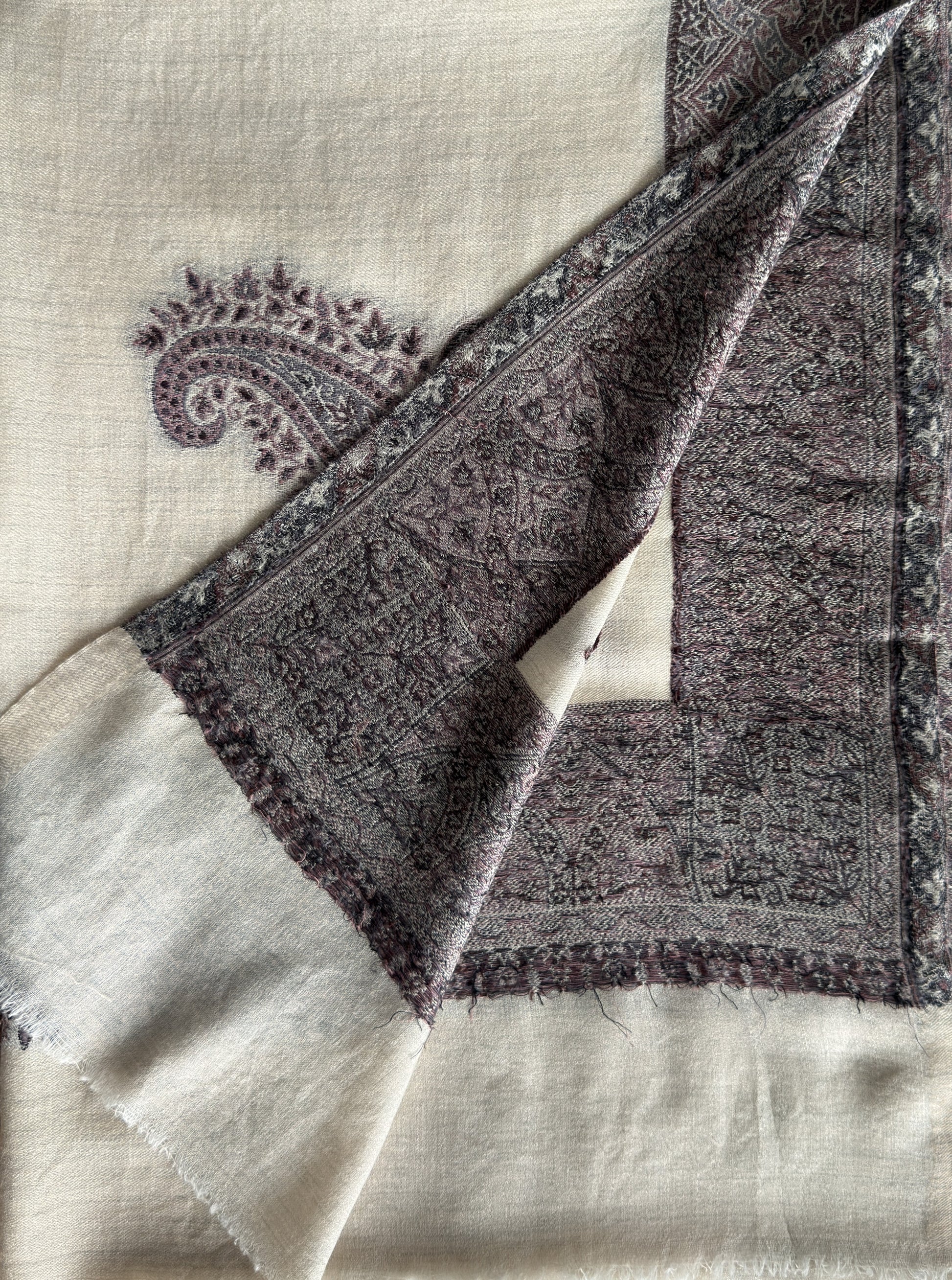 Luxury ivory wrap with traditional border pattern and smooth drape