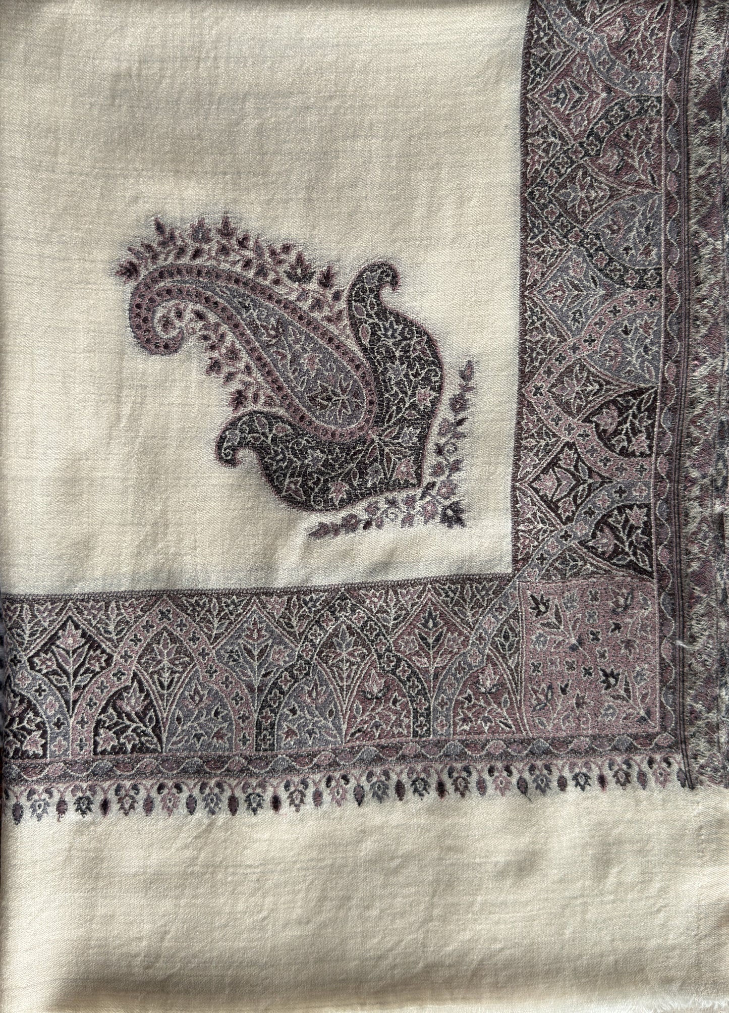 Luxury ivory wrap with traditional border pattern and smooth drape