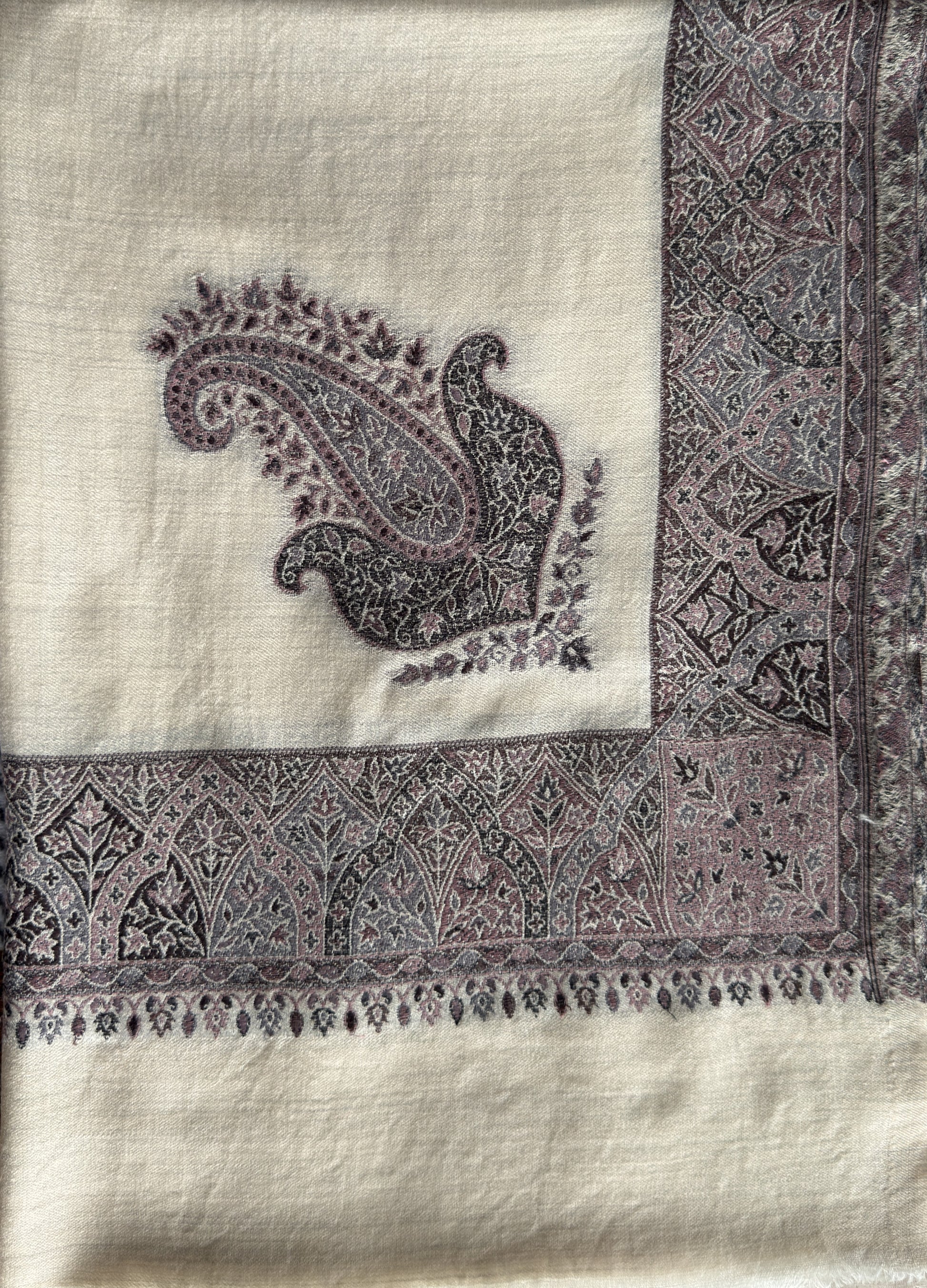 Luxury ivory wrap with traditional border pattern and smooth drape